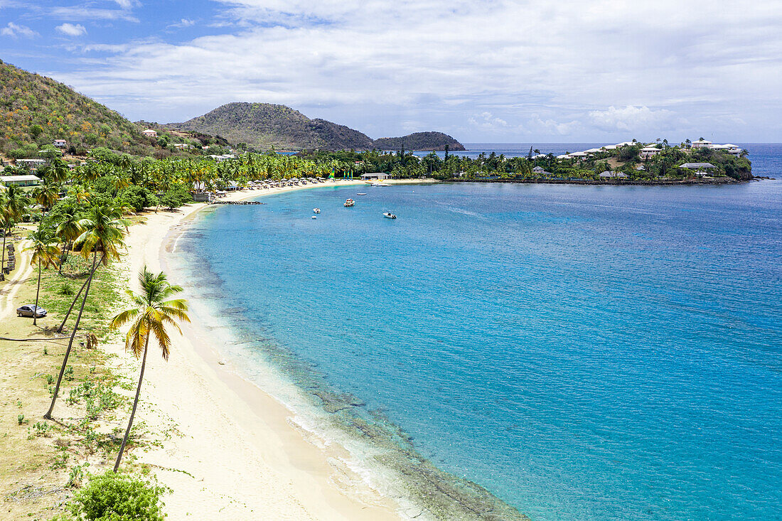 Empty tropical sand beach washed by Caribbean Sea, Morris Bay, Antigua, West Indies, Caribbean, Central America