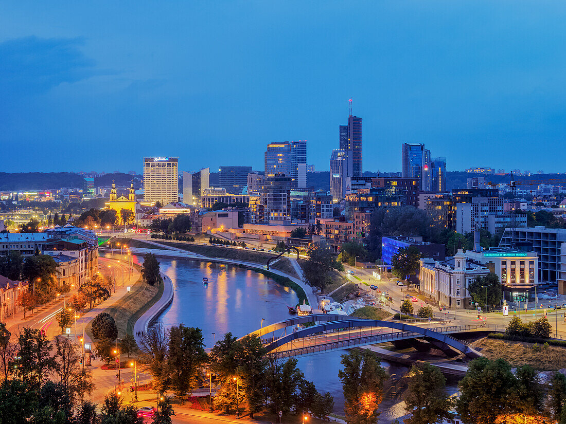 View over Neris River towards Snipiskes, New City Centre, dusk, Vilnius, Lithuania, Europe