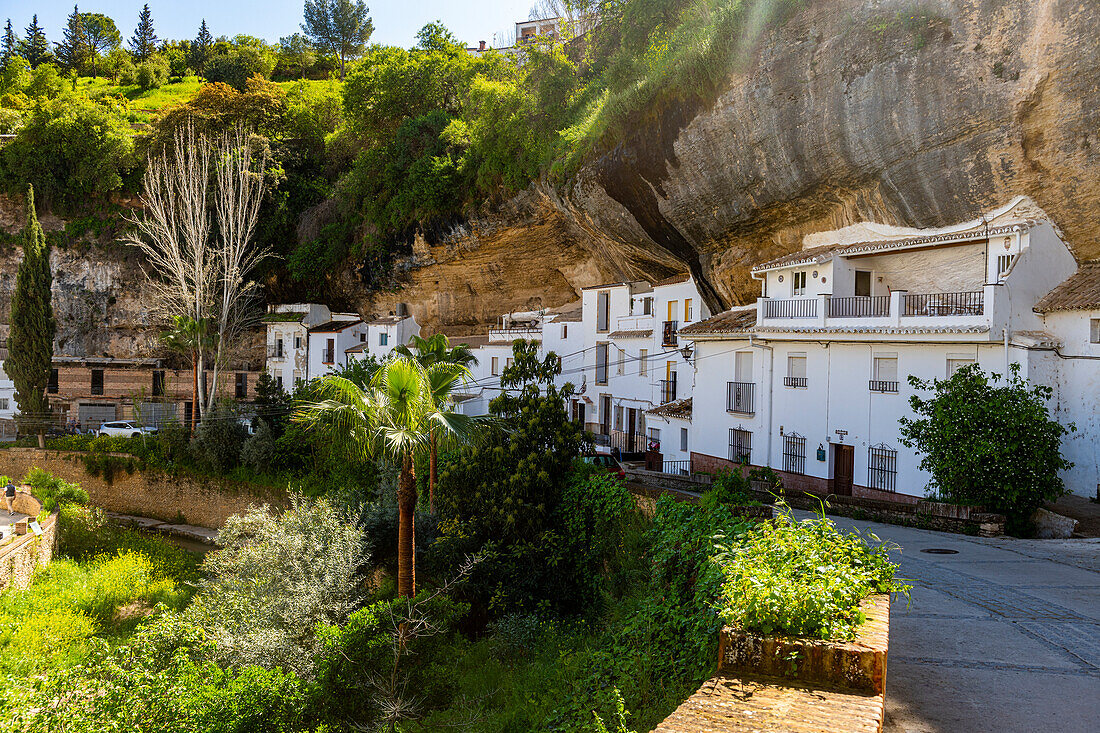 Dwellings built into rock overhangs above the Rio Guadalporcun, Setenil de las Bodegas, Andalucia, Spain, Europe
