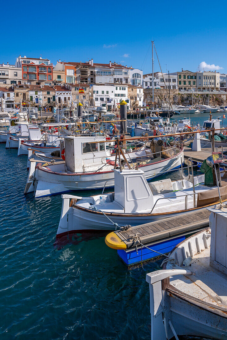 View of boats in marina overlooked by whitewashed houses, Ciutadella, Menorca, Balearic Islands, Spain, Mediterranean, Europe