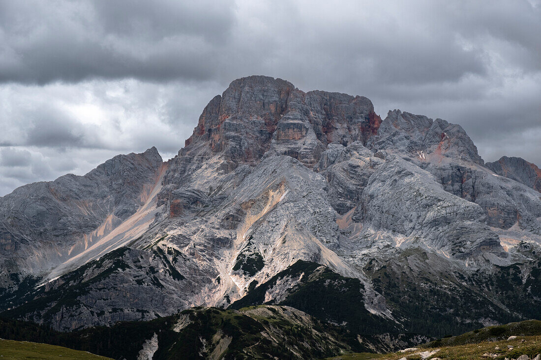 Croda Rossa D'Ampezzo mountain view from the top of Monte Specie with clouds in the sky, Dolomites, Italy, Europe