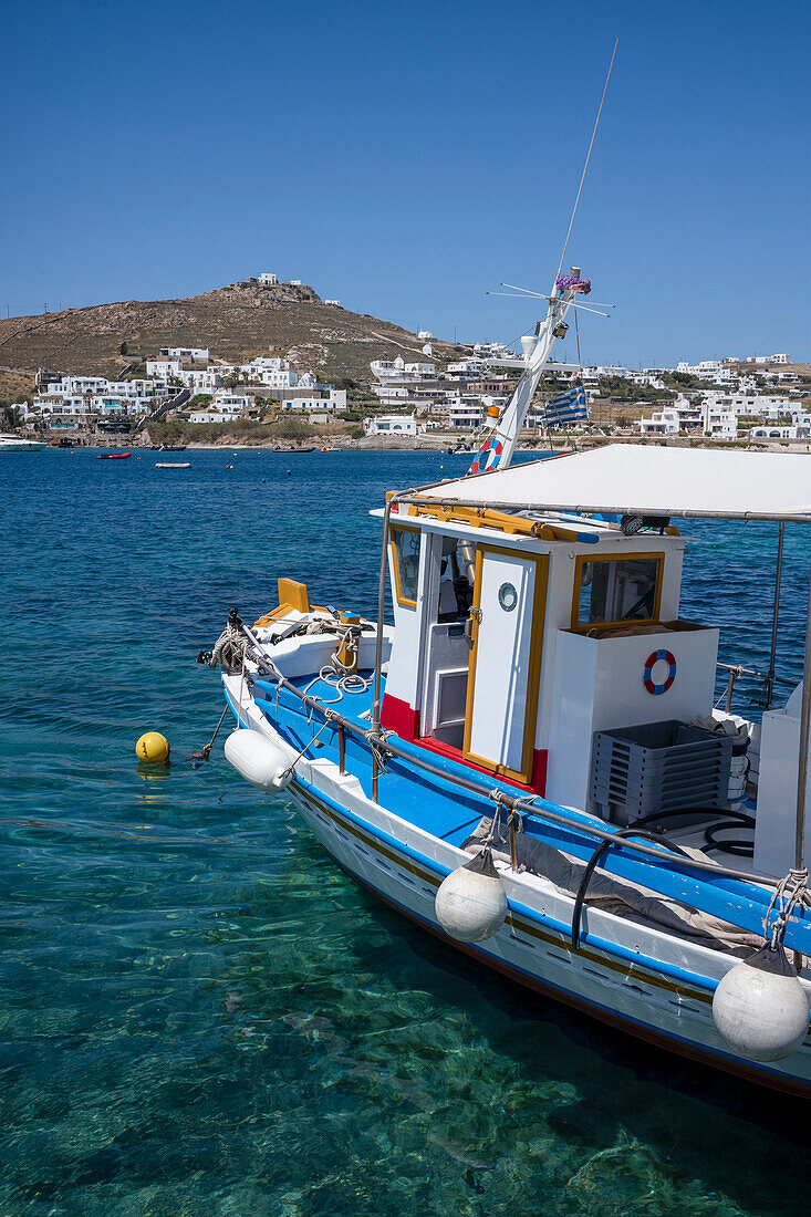 Traditional fishing boat moored in the harbour at Ornos Beach, Mykonos, The Cyclades, Aegean Sea, Greek Islands, Greece, Europe