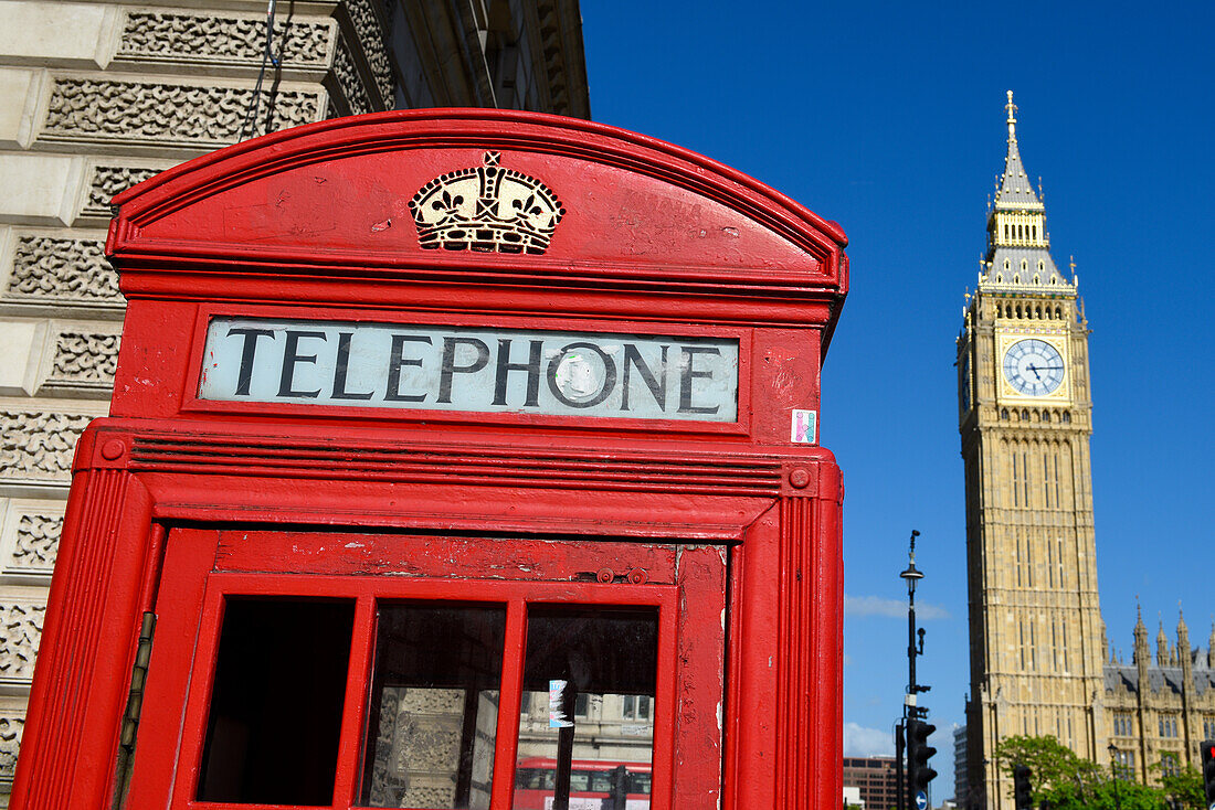 Iconic red telephone box with Big Ben (Elizabeth Tower) in background, Westminster, London, England, United Kingdom, Europe