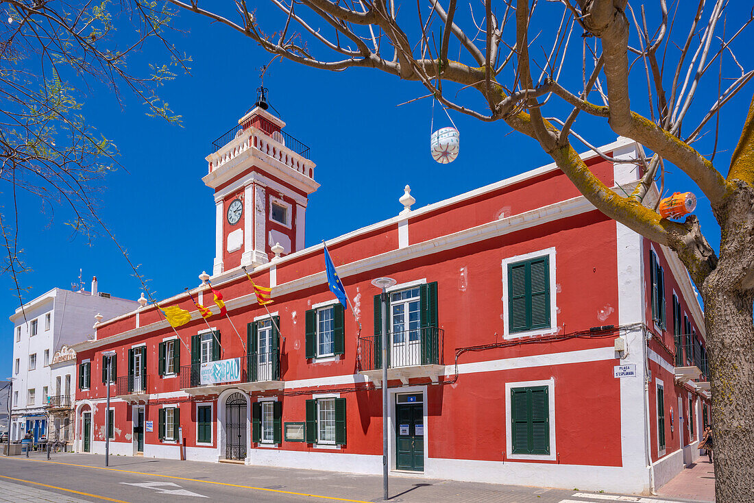 View of colourful archiecture in Placa de S'Esplanada against blue sky, Cales Fonts, Menorca, Balearic Islands, Spain, Mediterranean, Europe