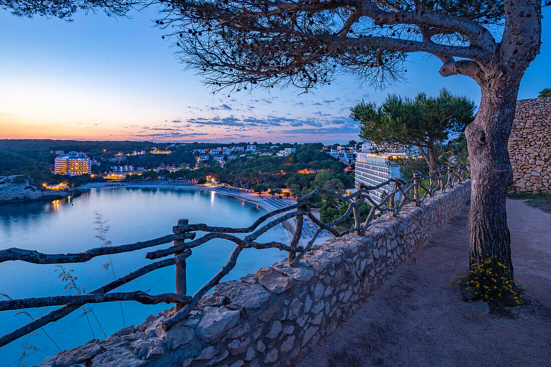 View of Platja de Cala Galdana at dusk in Cala Galdana, Cala Galdana, Menorca, Balearic Islands, Spain, Mediterranean, Europe