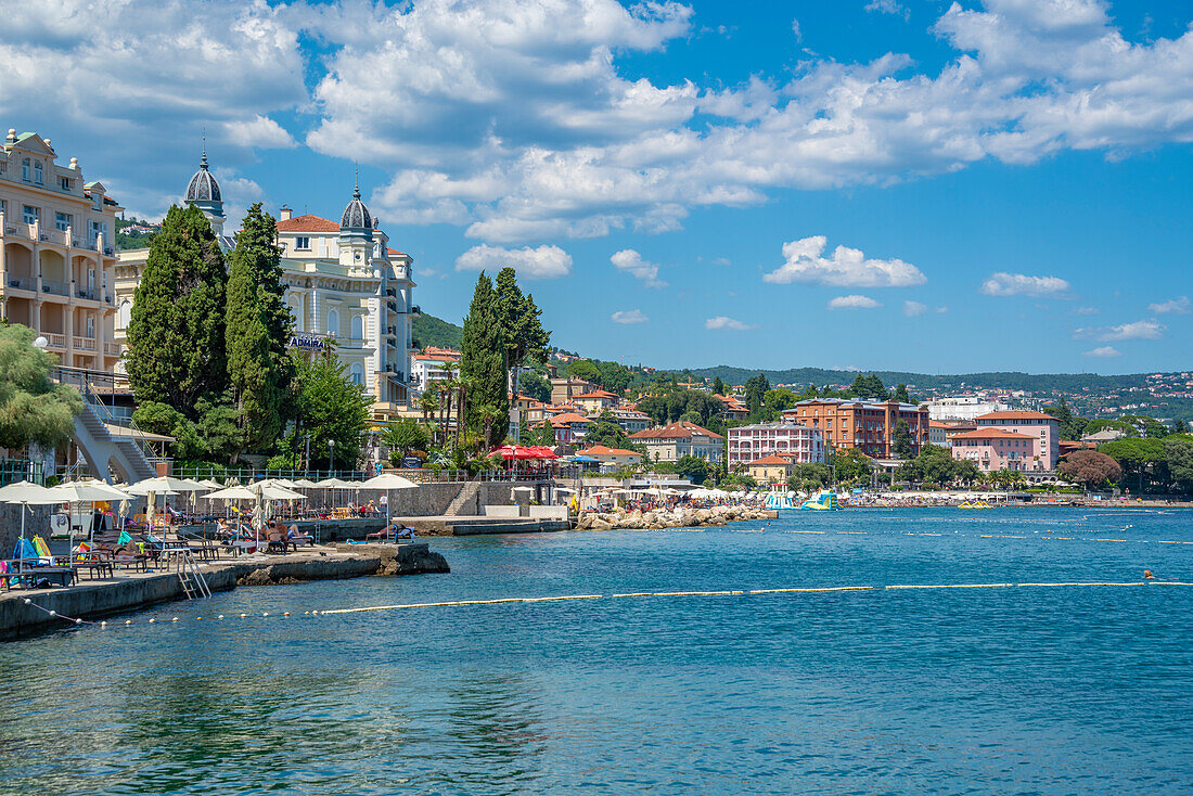 View of hotels and sunshades on The Lungomare promenade in the town of Opatija, Opatija, Kvarner Bay, Croatia, Europe