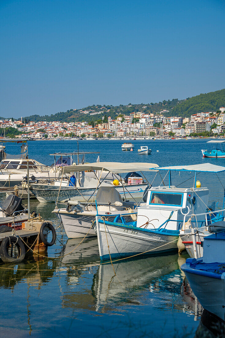 View of boats and Skiathos Town, Skiathos Island, Sporades Islands, Greek Islands, Greece, Europe