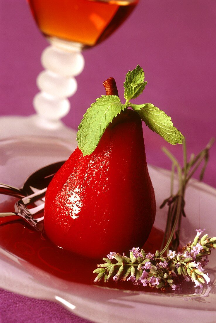 Pear poached in rose wine