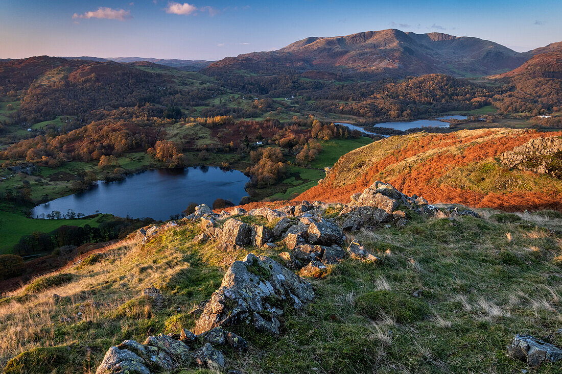 Loughrigg Tarn, Elter Water and Wetherlam from Loughrigg Fell in autumn, Lake District National Park, UNESCO World Heritage Site, Cumbria, England, United Kingdom, Europe