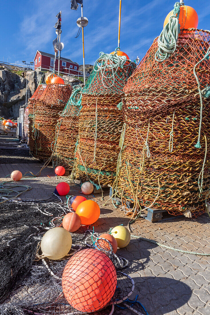 A view of commercial crab pots stored in the inner harbor in the city of Sisimiut, Greenland, Denmark, Polar Regions
