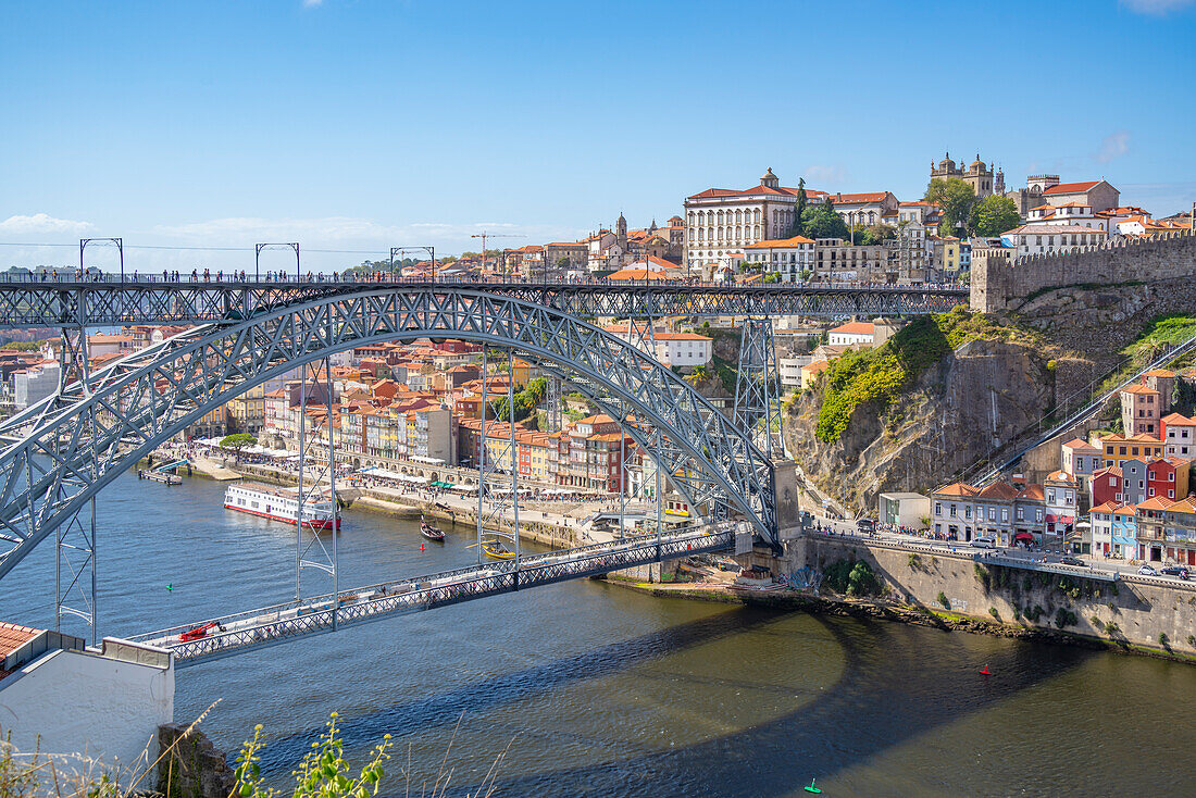 View of the Dom Luis I bridge over Douro River and terracota rooftops, UNESCO World Heritage Site, Porto, Norte, Portugal, Europe