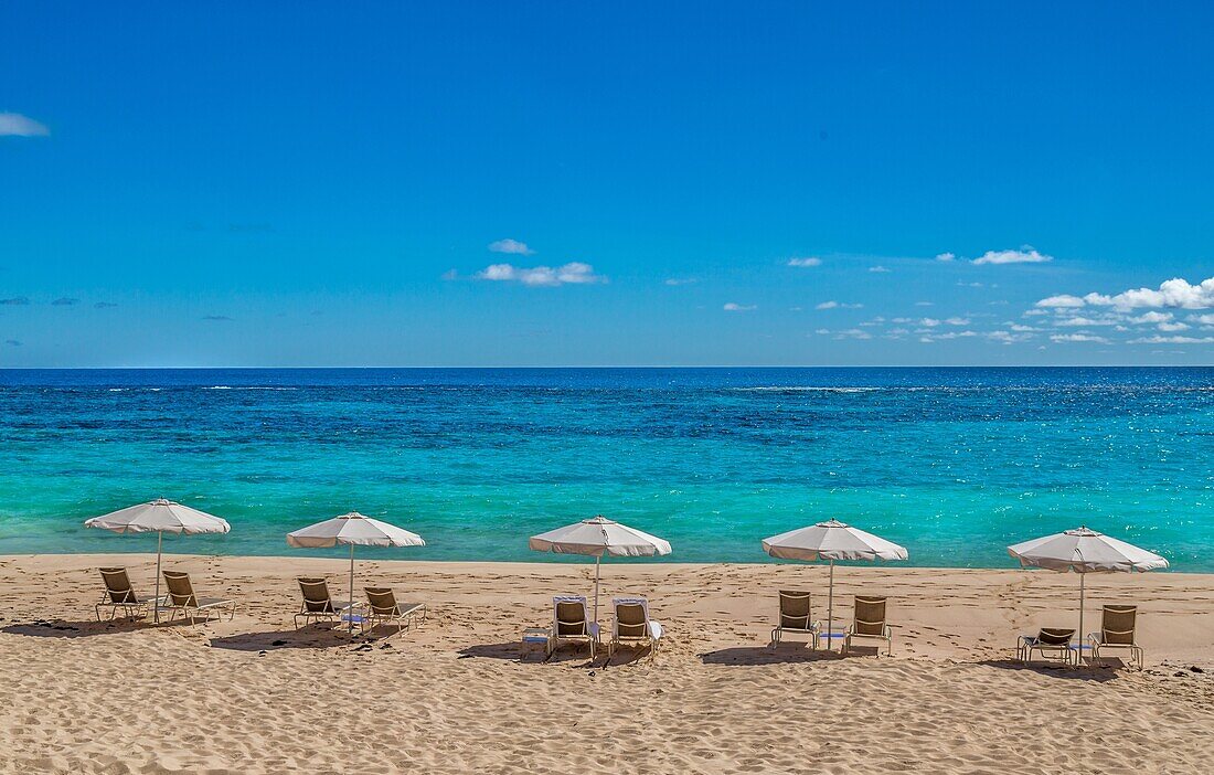 Loungers and umbrellas on Pink Beach West, Smiths, Bermuda, Atlantic, Central America