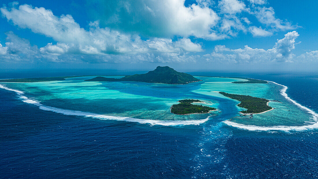 Aerial of the lagoon of Maupiti, Society Islands, French Polynesia, South Pacific, Pacific