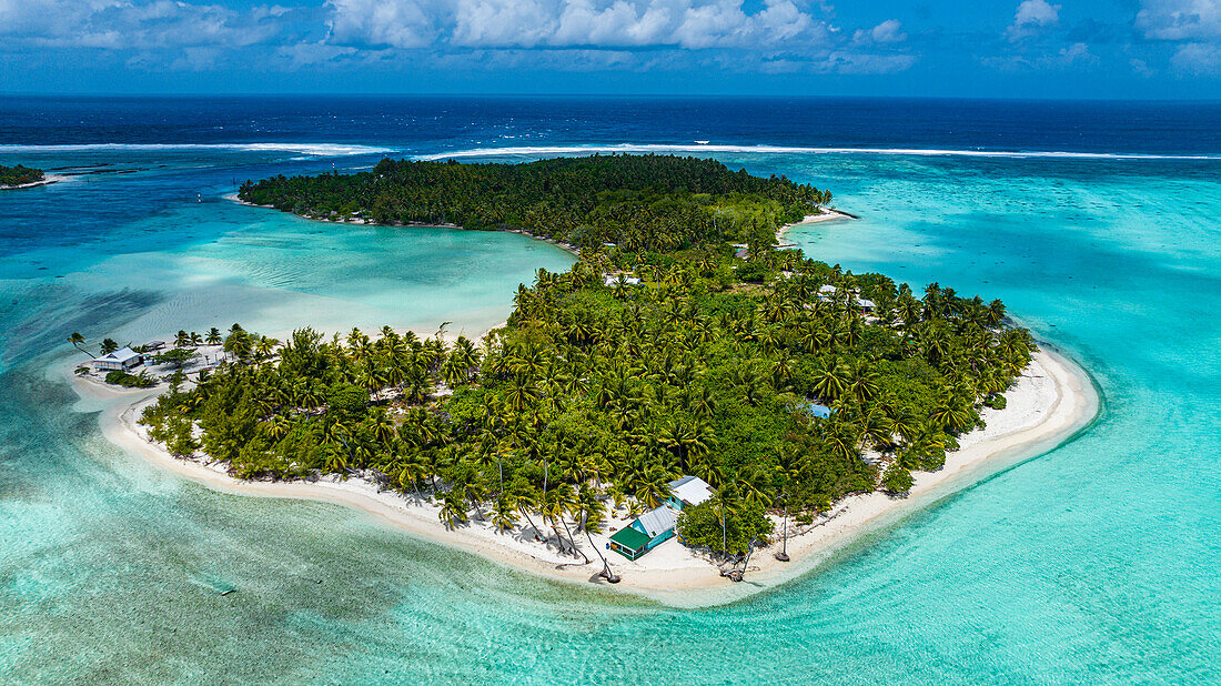 Aerial of a little islet with a white sand beach, Maupiti, Society Islands, French Polynesia, South Pacific, Pacific