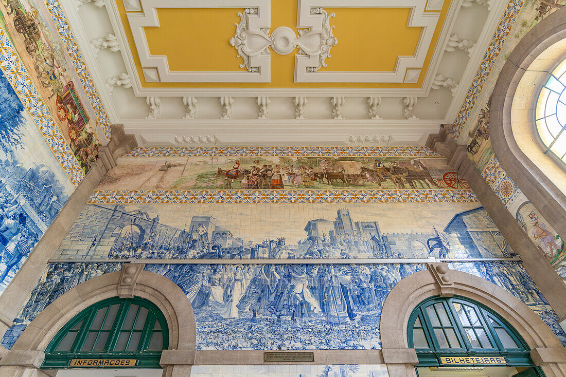 View of azulejos on walls of ornate interior of Arrivals Hall at Sao Bento Railway Station in Porto, Porto, Norte, Portugal, Europe