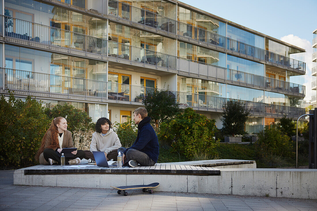 Friends at playground talking