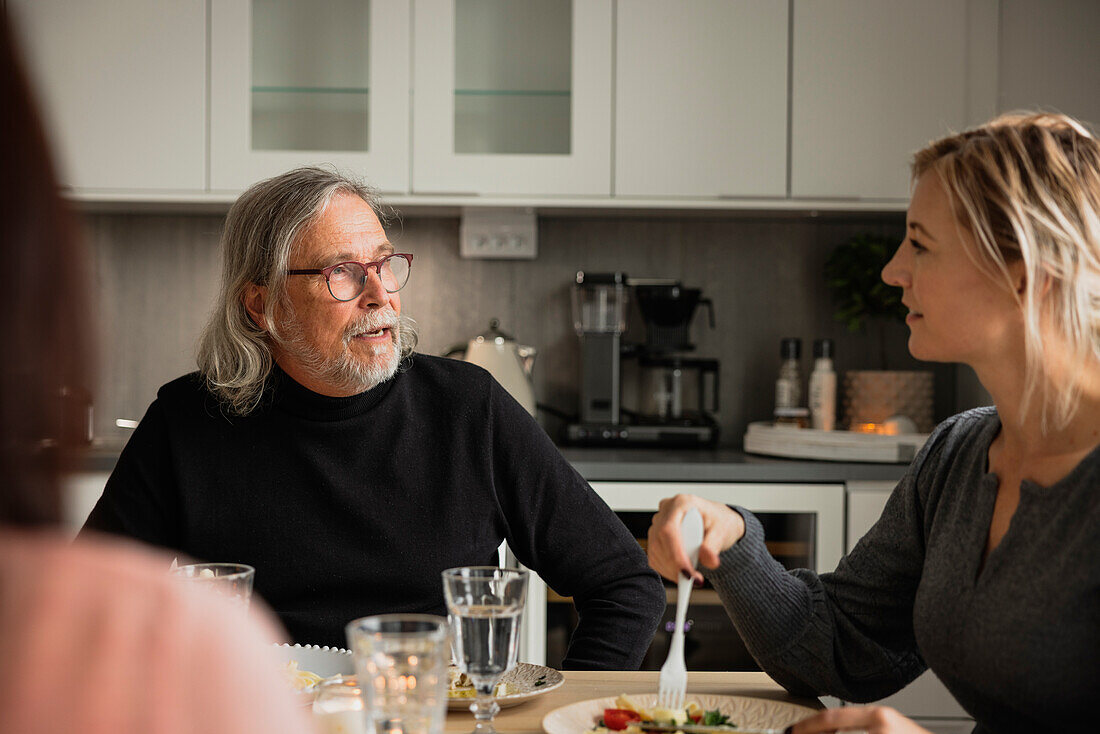 Family eating dinner at home