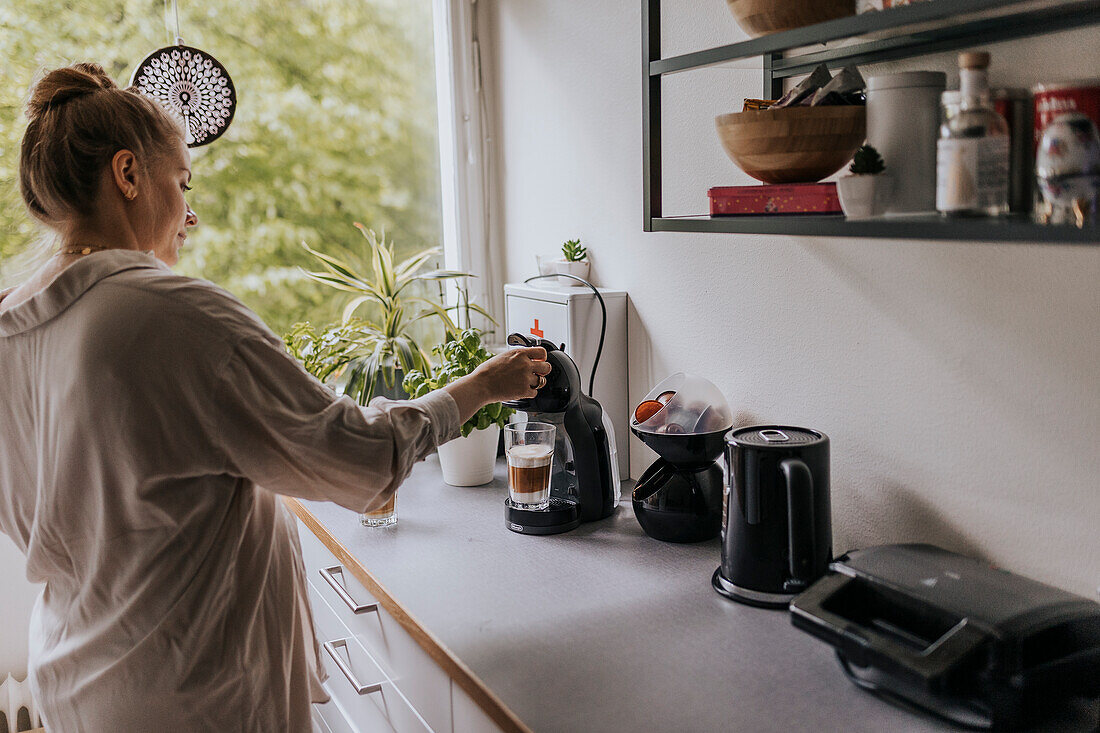 Woman preparing coffee