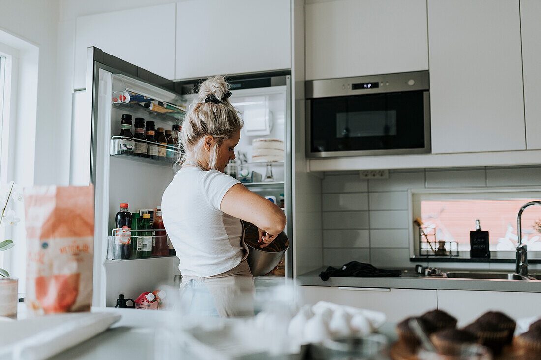 Woman baking in kitchen