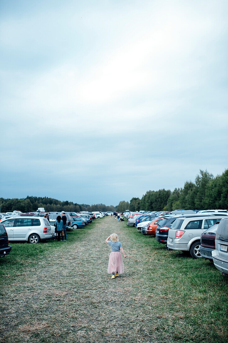 Girl on outdoor parking