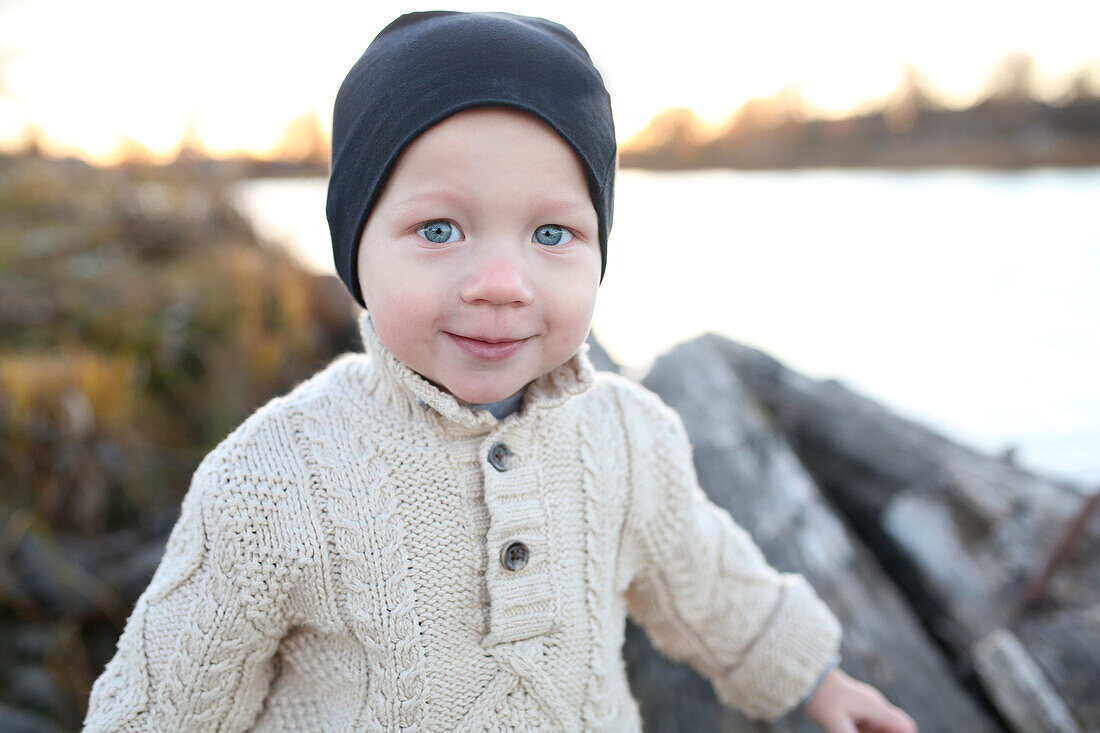 Smiling boy at lake