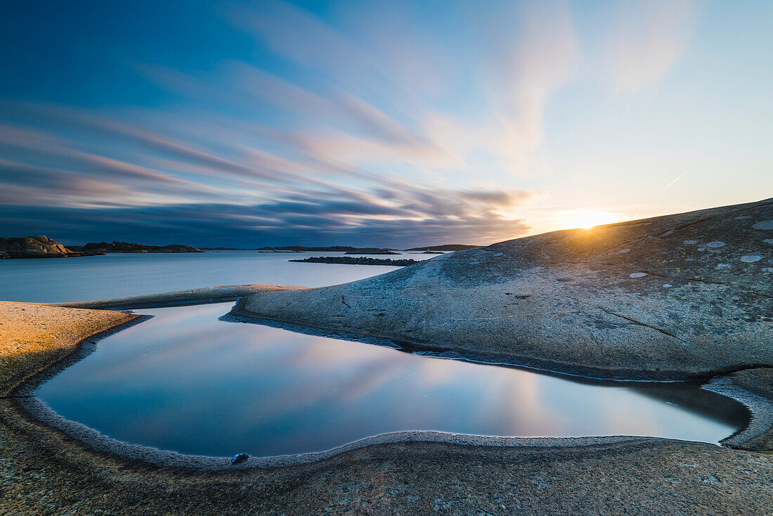 Sunset at rocky coast