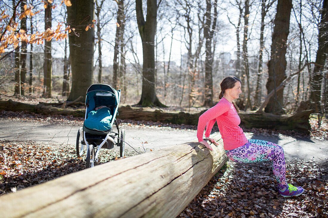 Woman exercising in forest