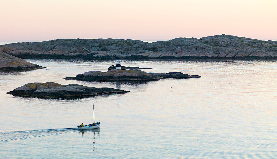 Boat near rocky coast