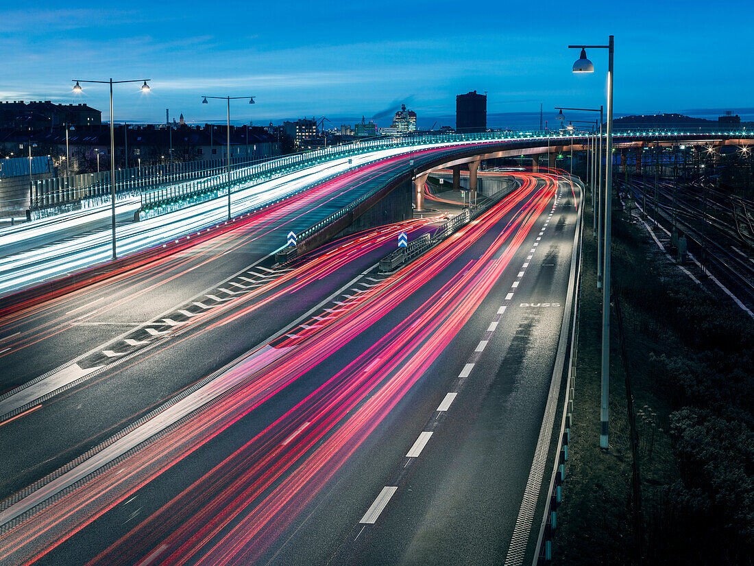 Road traffic at dusk