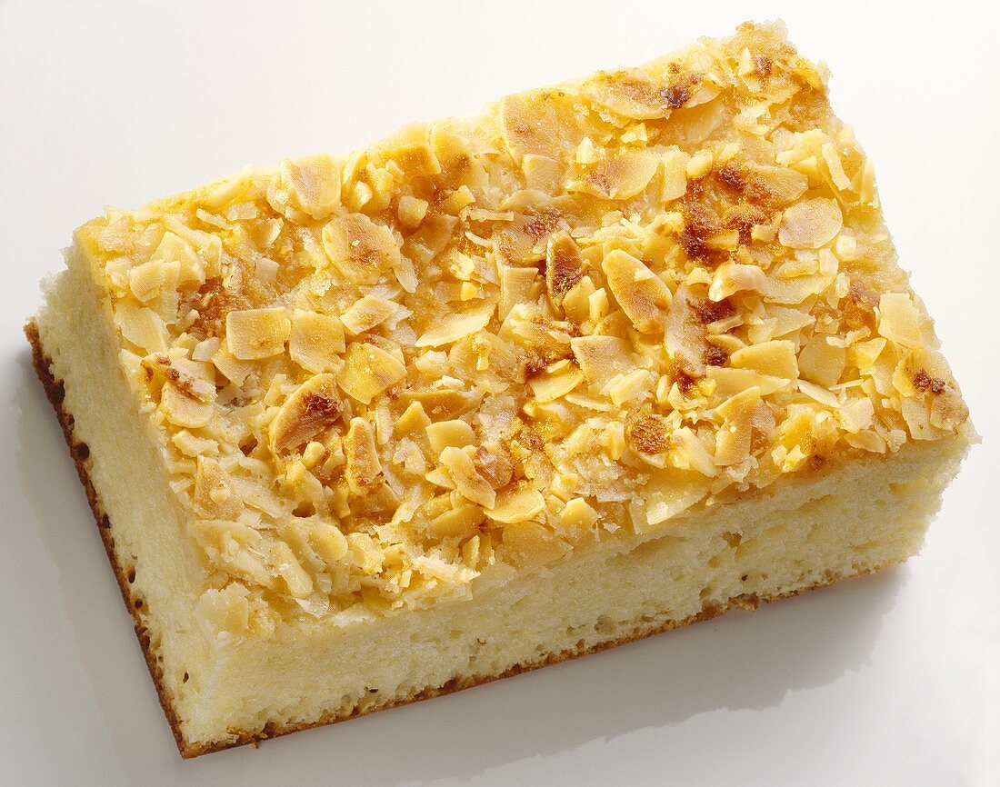 A piece of butter cake with almonds