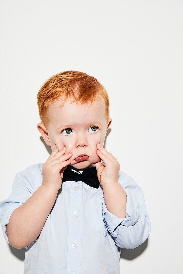 Portrait of toddler wearing bow tie