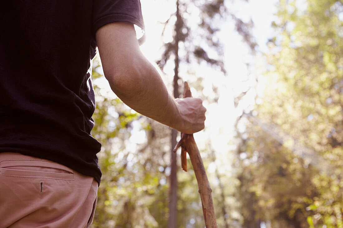 Man holding stick