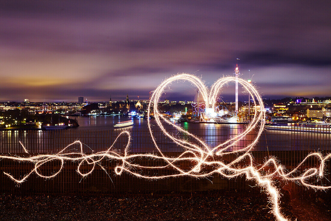 Heart shape made from light trails