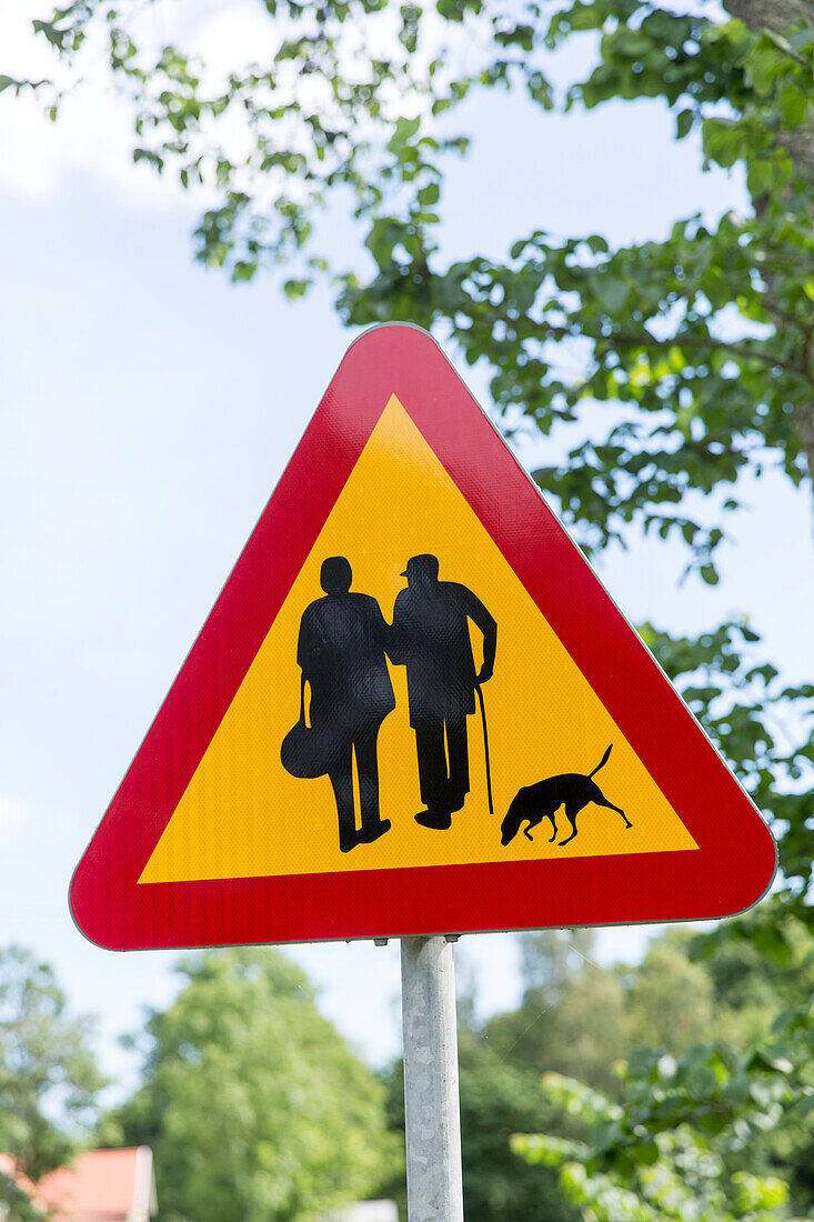 Senior people crossing sign