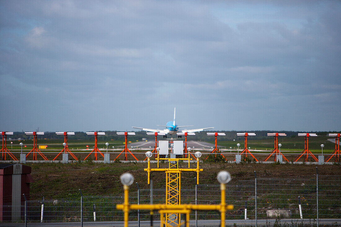 Airplane landing on runway
