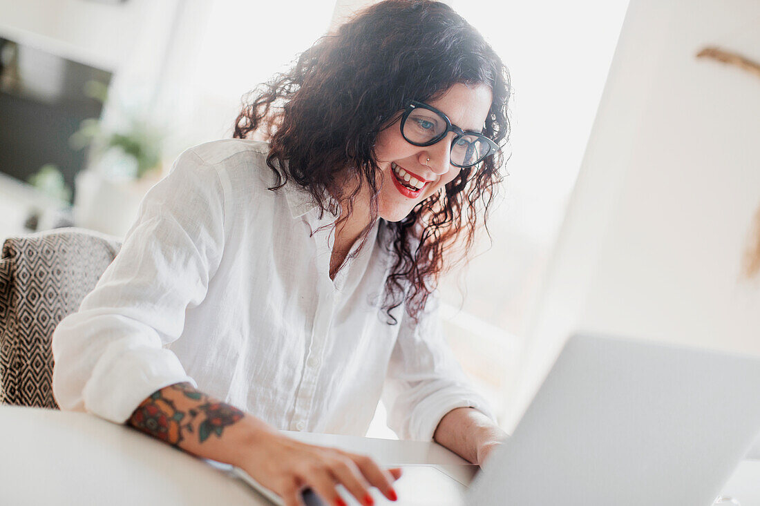 Young woman using laptop