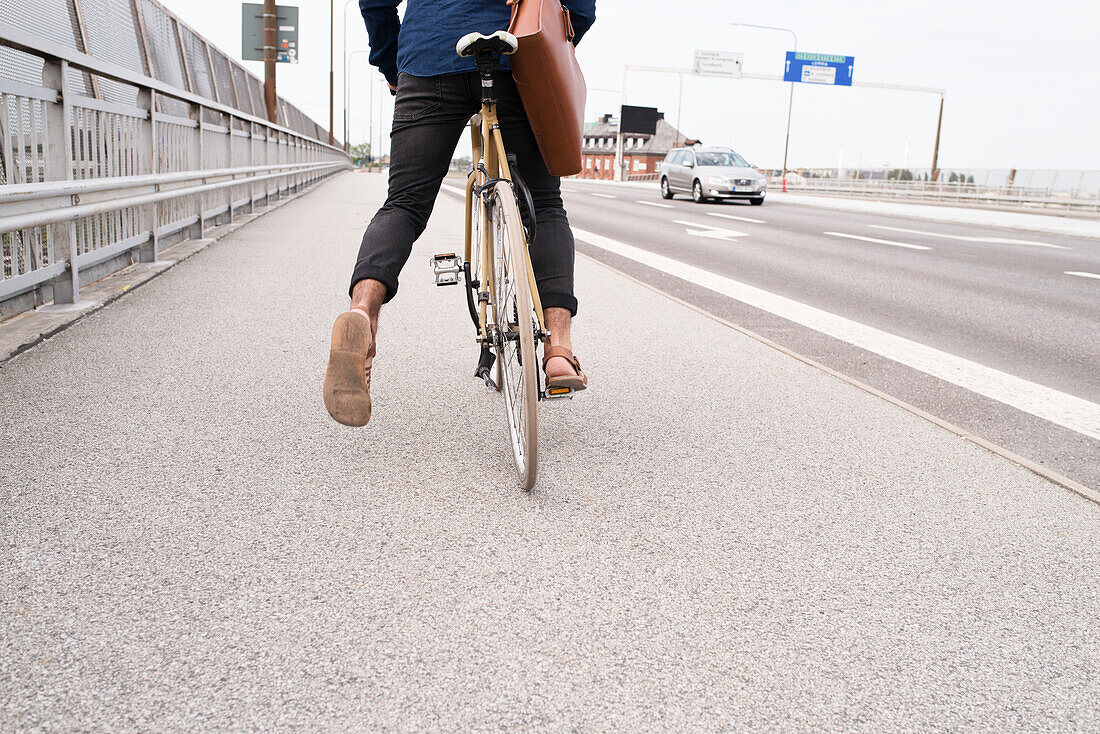 Man cycling on street