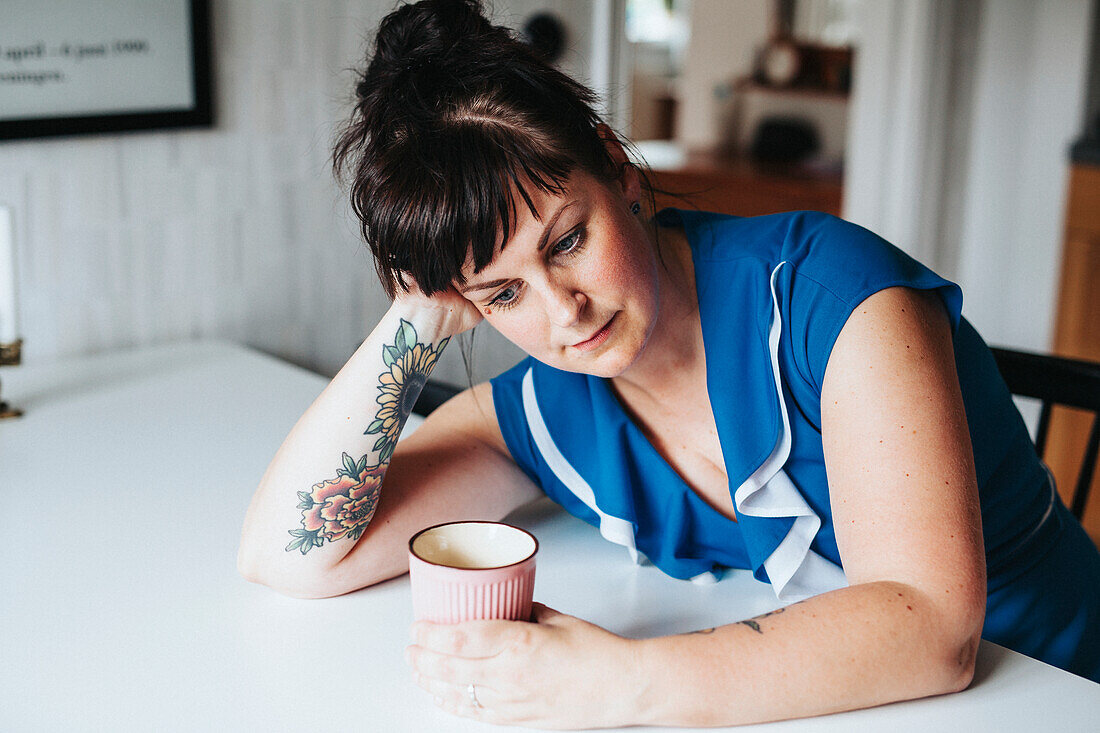 Woman having coffee