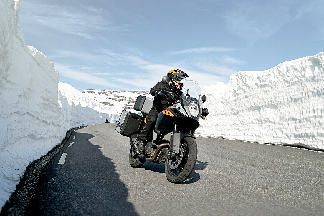 Biker on mountain road