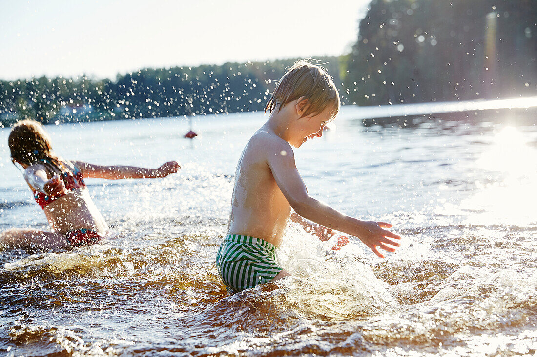 Boy playing in water