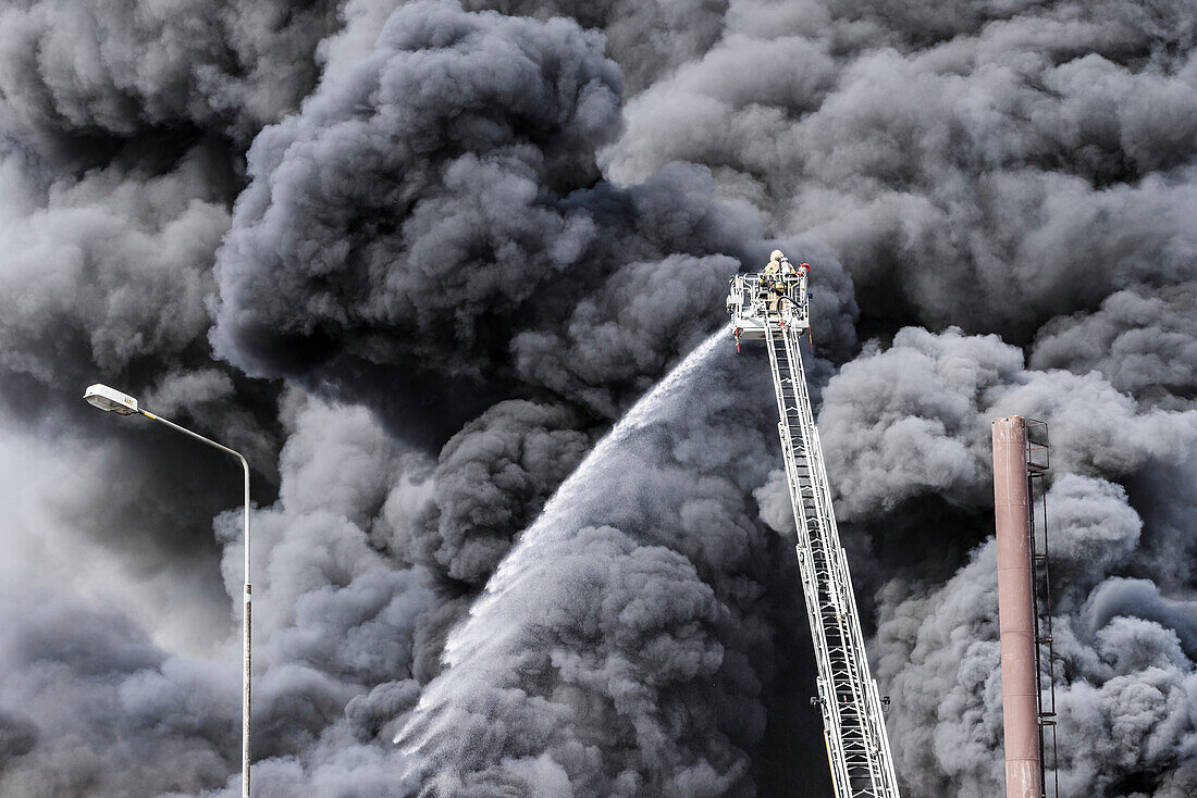 Firefighters fighting fire