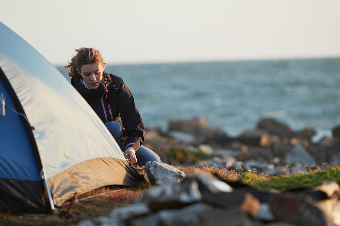 Woman near tent
