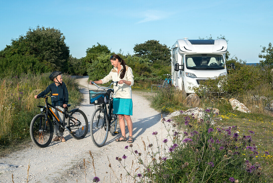 Mother and son cycling