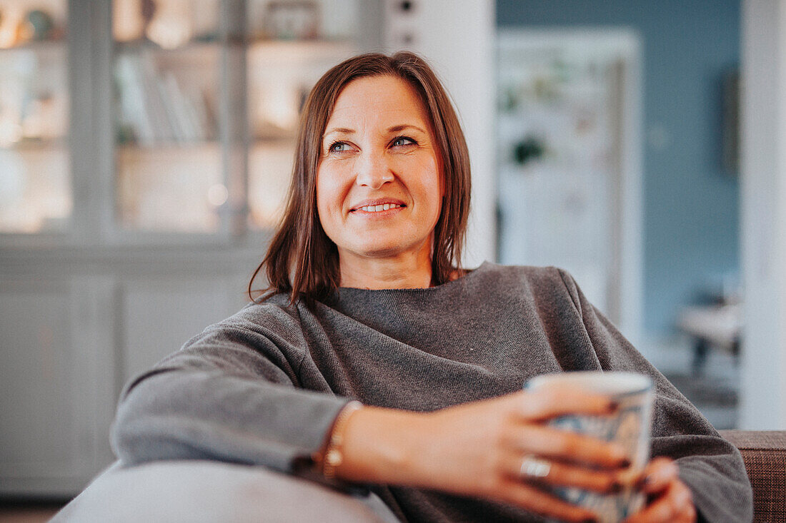 Smiling woman looking away