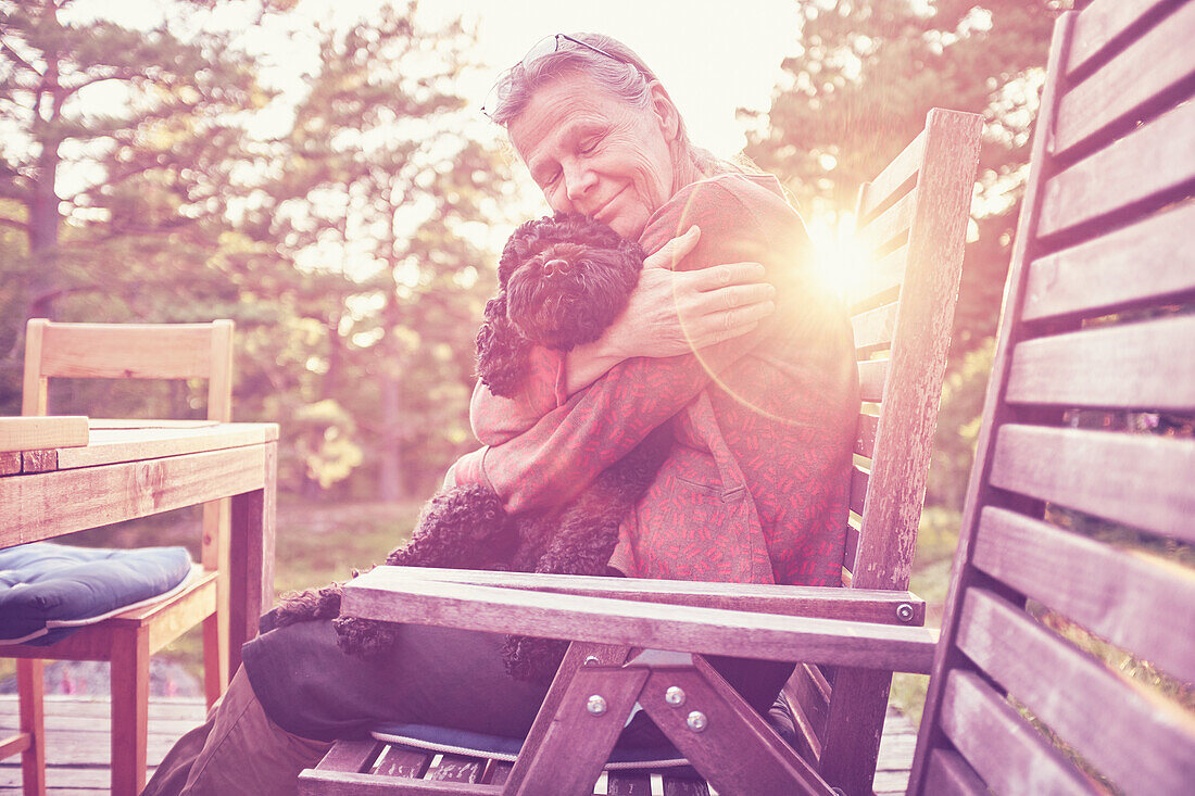 Smiling woman with dog