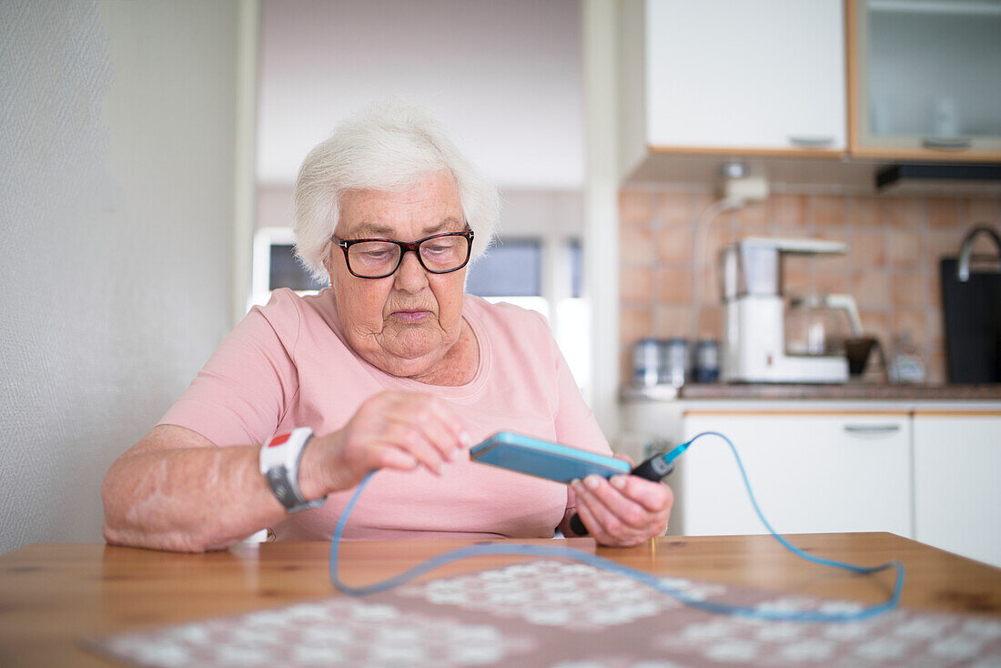 Senior woman using smartphone