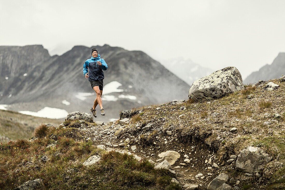 Man running in mountains