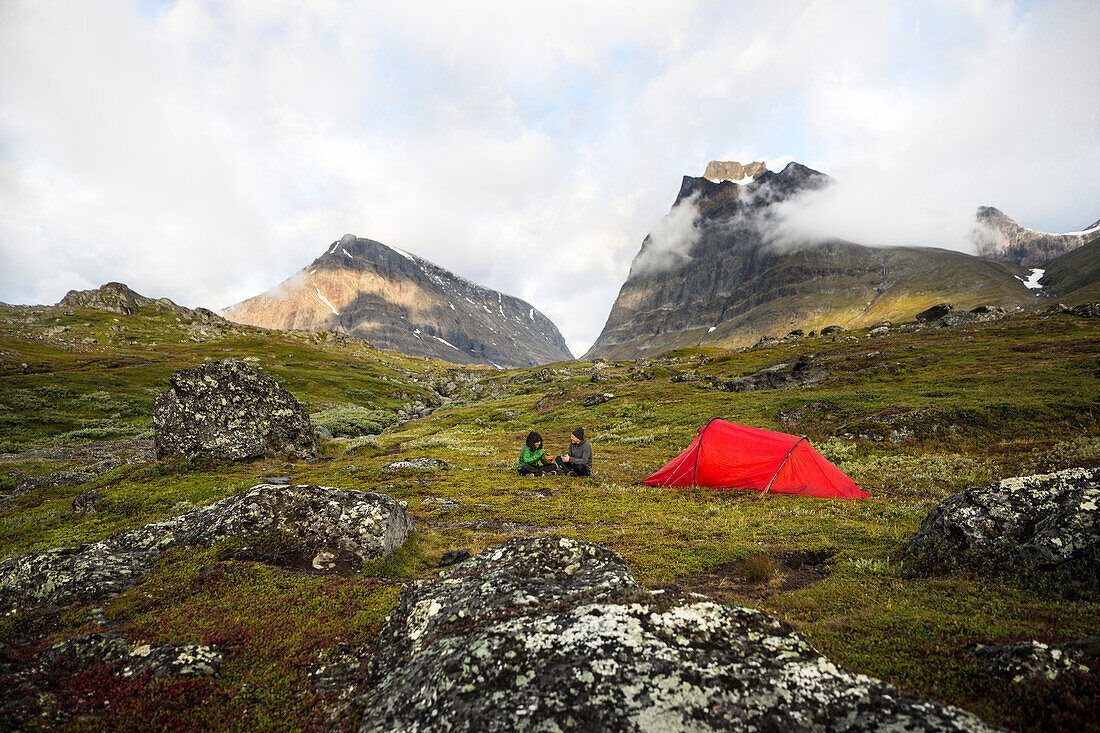 Couple camping in mountains