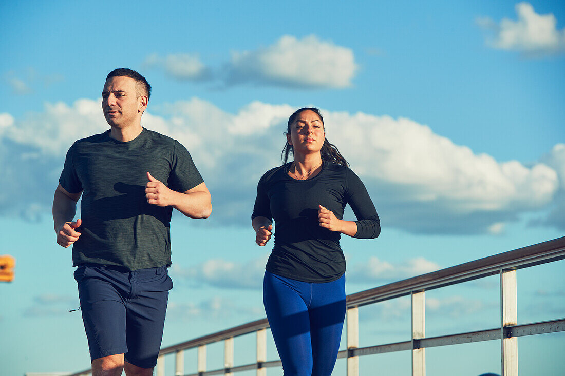 Man and woman jogging