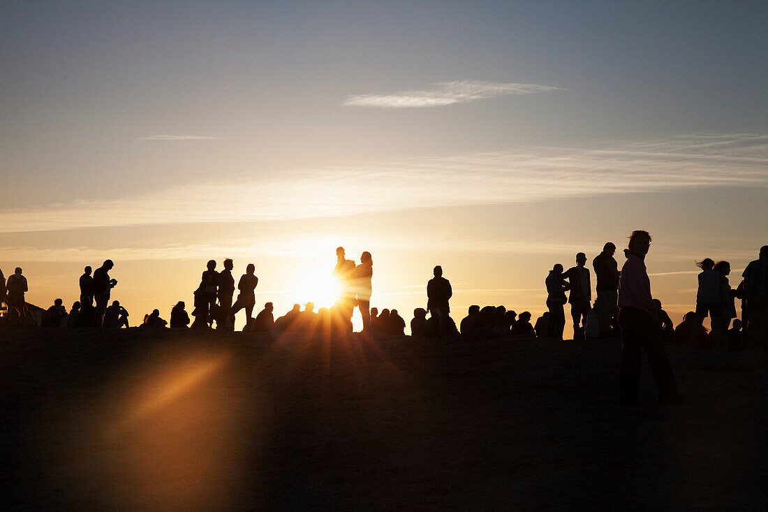 Silhouette of people in evening light